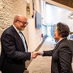 Judge Xue Hanqin, a Member of the ICJ, greets Judge Tomas Heidar, President of ITLOS, in the Deliberation Room of the Court 