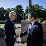 HE Mr Luc Frieden, Prime Minister of the Grand Duchy of Luxembourg, is greeted by HE Judge Iwasawa Yuji, President of the International Court of Justice on the steps of the Peace Palace